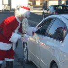 Santa Claus greets a visitor.